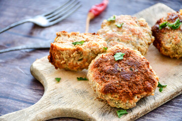 Home made  fried meatballs   on wooden rustic background.Cutlets from beef and pork meat.