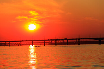 Fototapeta na wymiar Beautiful sunset over the Dnieper river in Dnipro city, Ukraine