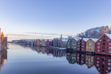 Fototapeta na wymiar Winter and cold in the city by the Nidelven - old warehouses -Trondheim,Trøndelag,Norway,scandinavia,Europe 