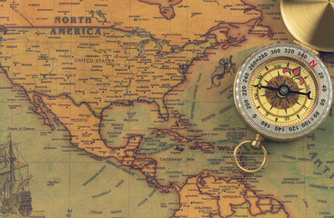 Fototapeta na wymiar Vintage world map with compass. North America