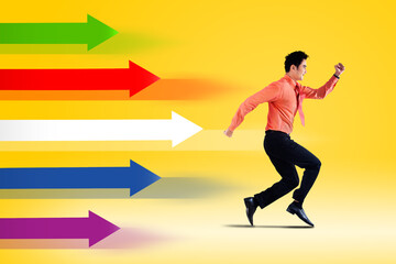 Businessman running race with colorful arrows