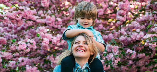 Spring banner of mother and son. Mothers day. Family and motherhood concept.