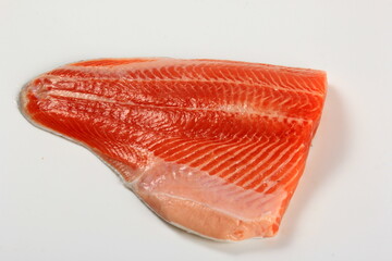 Raw trout fillet isolated on white background. Raw orange salmon fish fillet