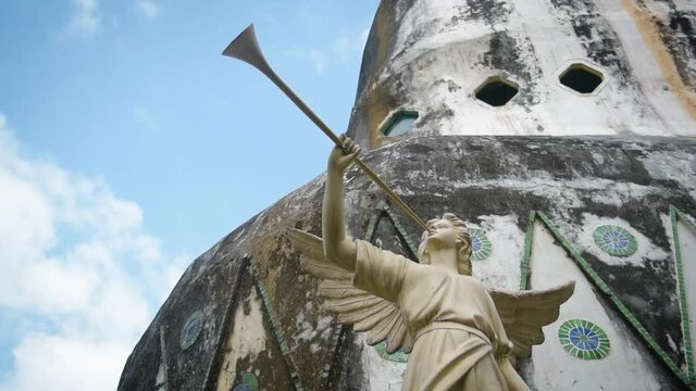 Angel with trumpet statue in the chicken church Jogjakarta