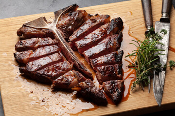 Grilled porterhouse beef steak. Sliced T-bone