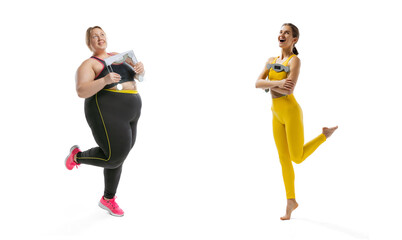 Happy young slim girl and plus-size woman wearing sport uniform isolated on white background. Concept of healthy lifestyle, fitness, sport, nutrition and weight loss.