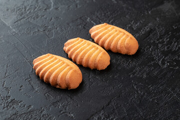 Healthy food concept. Homemade organic energy cookies on black slate stone background with copy space