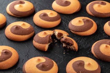 Healthy food concept. Homemade organic energy cookies on black slate stone background with copy space