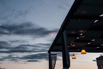 veranda with a beautiful canopy design with white fabric and lights