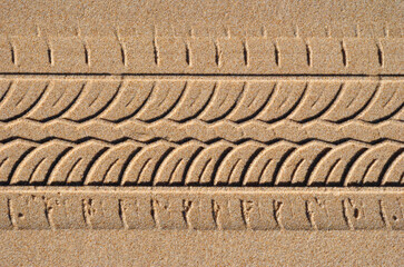 Close Up of Tyre Pattern on Sandy Beach