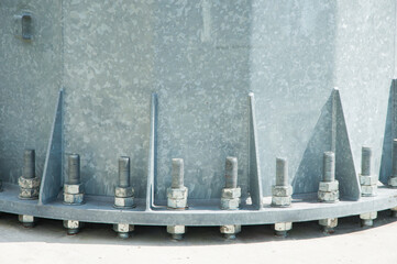 the post is bolted with anchor bolts. bolted pipe connection. strong fastening concept