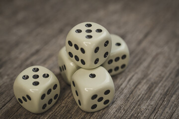 Playing cubes on a wooden table