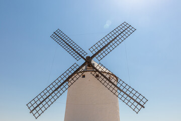 Close up view of a large white windmill