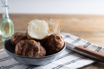 Trendy Winter vegetable. Jerusalem artichoke,