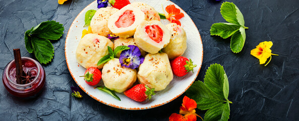 Dumplings or knedliky with strawberries filling