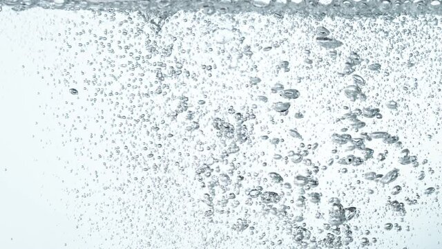 Super Slow Motion Shot of Moving Bubbles on White Background at 1000fps. Filmed on High Speed Cinematic Camera.