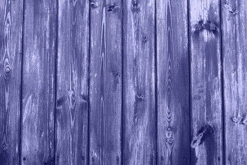 Very Peri. The texture of wood planks in the trendy 2022 Very Peri color. Color of the year 2022. Background for designers