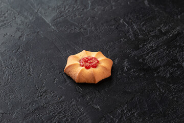 Healthy food concept. Homemade organic energy cookies on black slate stone background with copy space