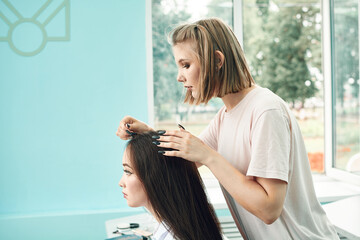 Fototapeta premium high school girls students comb their hair. Anime style