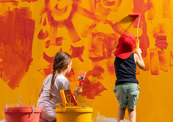  kids painting wall in room