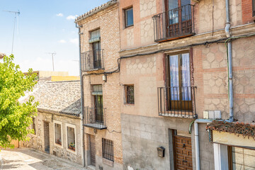 Fototapeta na wymiar Typical facades of old houses in the city of Toledo