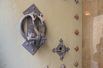 door with knocker at the falson palace in mdina (malta) 