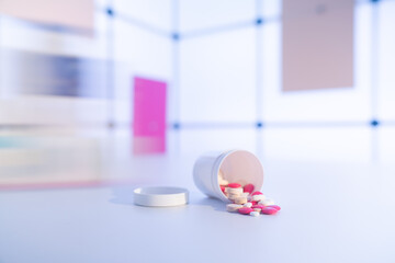 Pills an pill bottle on blurred background