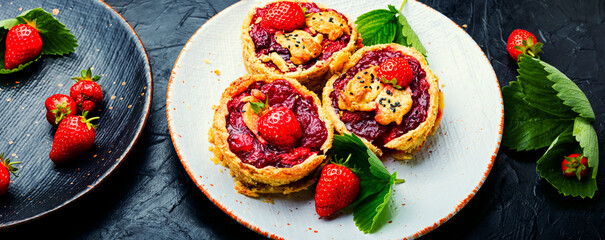 Fototapeta Summer tartlets with strawberries,extra wide obraz