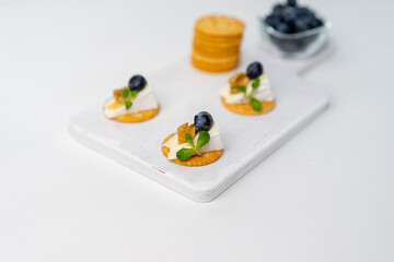 canape with camembert cheese and walnut