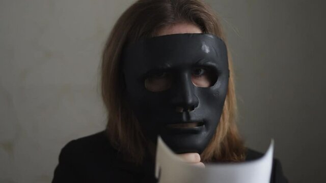 espionage mask, confidentiality of personal information on the web, anonymous search and use of the Internet,woman with black mask