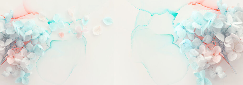 Creative image of pastel blue and pink Hydrangea flowers on artistic ink background. Top view with copy space