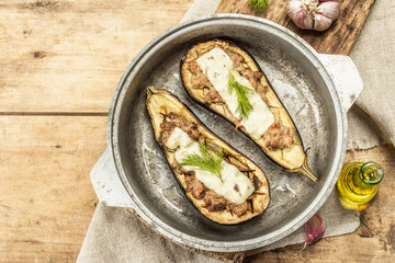 Stuffed eggplant ready to eat with ground meat, vegetables, and spices