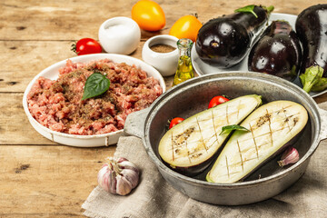 Stuffed eggplant ready to bake with ground meat, vegetables, and spices
