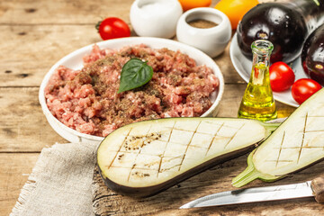 Stuffed eggplant ready to bake with ground meat, vegetables, and spices