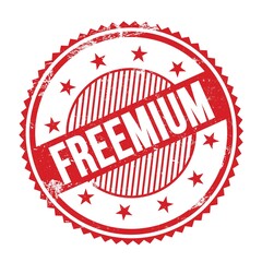 FREEMIUM text written on red grungy round stamp.