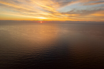 Picturesque nature background bright sunrise over the Sea. Spain