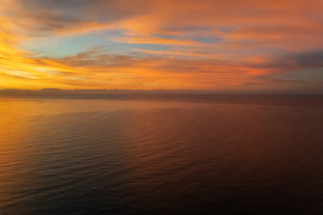Picturesque nature background vibrant sunrise over the Sea. Spain