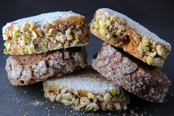 chocolate shortbread cookies on a dark background