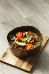 Bowl of thick lentil soup with vegetables
