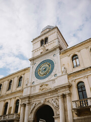Fototapeta na wymiar Clock tower in a square of Padua Italy