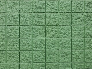 Smooth green walls with beautiful patterns used to decorate the building.