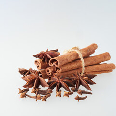 Star anise and cinnamon stick isolated on white background, top view