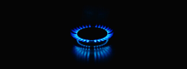Flame of a gas burner on a black background. Combustion of Natural gas on a black background. Gas...