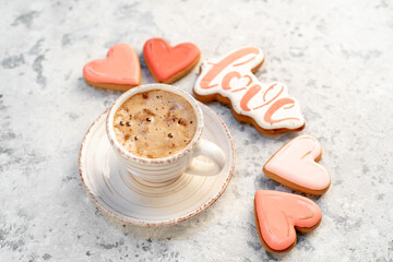 cappuccino and heart-shaped cookies for valentine's day