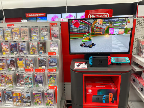 Frankfurt, Germany - 21st December 2021: Shopping in Frankfurt. Visiting a Saturn market, viewing the new Nintendo Switch console for gaming.