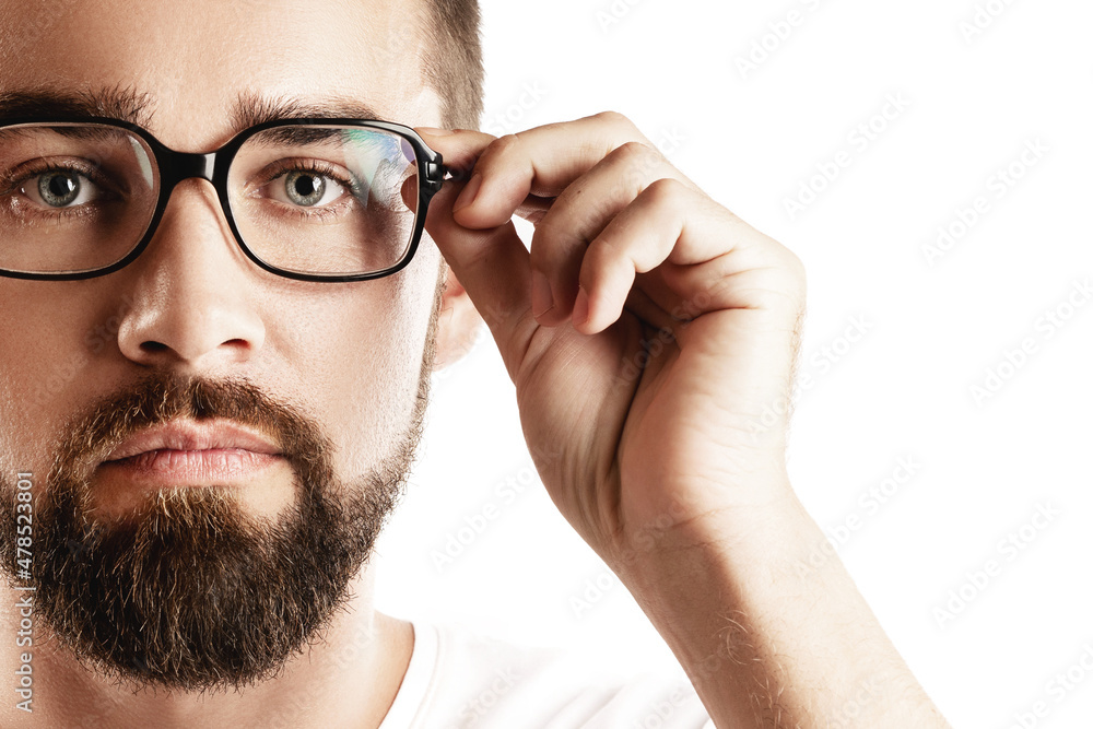 Sticker Young and handsome bearded man wearing eyeglasses