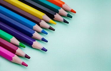 Colored pencils on bright colored background