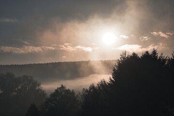sunrise with fog in the early morning hours. mystical atmosphere