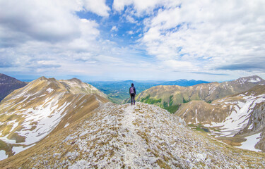 Fototapeta premium Palazzo Borghese in Montemonaco (Italy) - The landscape snow summit of Palazzo Borghese mount, with lake, in Marche region province of Macerata. One of highest peaks in Monti Sibillini mountain park
