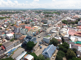 Obraz premium Aerial view from a drone that shows the border town of Mae Sai District, Thailand, And international immigration Tachileik District Of Myanmar